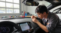 Cadillac Could Have Used A $2 Sticker On The Optiq. It Chose To Etch Glass Instead